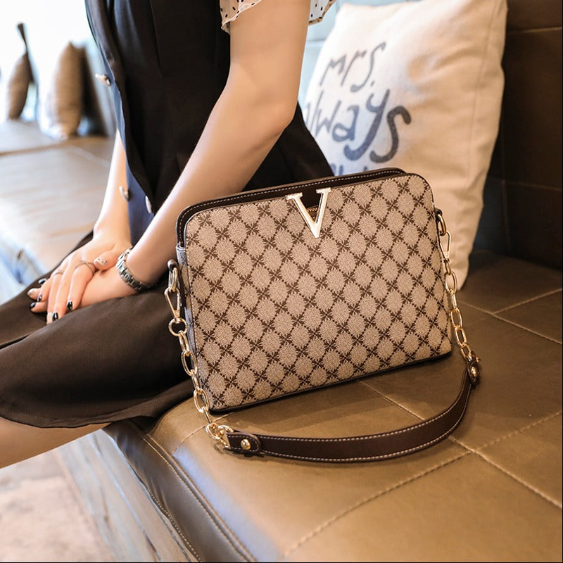 Mila's Vogue V-Trim: Metallic Chain Crossbody Mila's Vogue V-Trim: Metallic Chain Crossbody