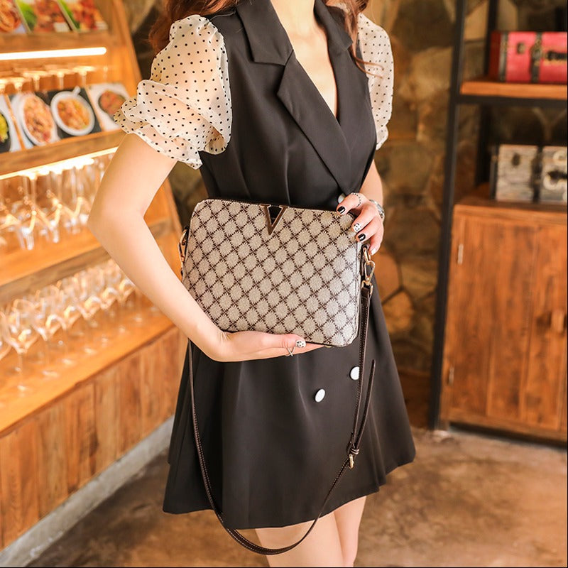 Mila's Vogue V-Trim: Metallic Chain Crossbody Mila's Vogue V-Trim: Metallic Chain Crossbody
