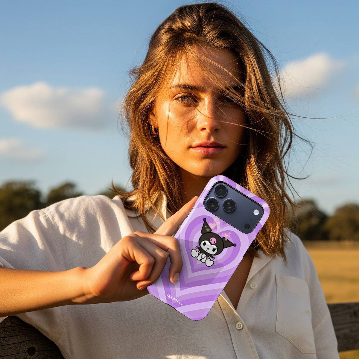 Heart Havoc Crystal Series iPhone case in hand lifestyle image